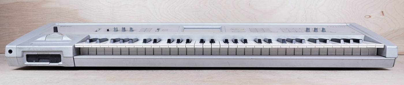Korg Triton 61-Key 62-Voice Polyphonic Workstation Keyboard Silver w/ Power Cable
